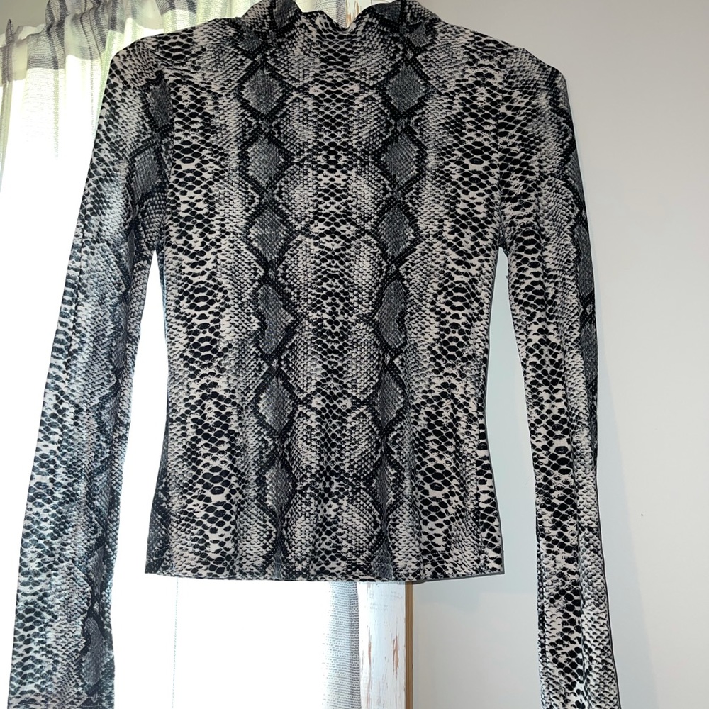 Turtle neck shirts both size small